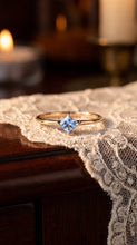Load image into Gallery viewer, Princess cut aquamarine solitaire ring in 14K gold featuring a single sparkling gemstone, elegant and stylish jewelry piece.