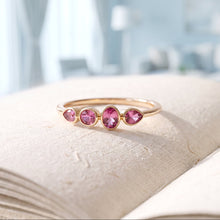Load image into Gallery viewer, Pink Tourmaline gemstone ring with four stones set in 14K gold, featuring a delicate and elegant design by MiShelli.