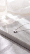 Load image into Gallery viewer, White sapphire tiny solitaire silver necklace featuring a delicate pendant, designed by MiShelli.