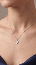 Load image into Gallery viewer, Sterling silver Crescent Moon pendant necklace by MiShelli featuring a delicate, dainty design on a thin chain.