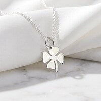Load image into Gallery viewer, Sterling silver Shamrock Necklace with a clover pendant, crafted by MiShelli, featuring a detailed .925 silver design.